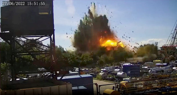 A view of the explosion as a Russian missile strike hits a shopping mall amid Russia's attack on Ukraine, at a location given as Kremenchuk, in Poltava region, Ukraine in this still image taken from handout CCTV footage released June 28, 2022.  CCTV via Instagram @zelenskiy_official/Handout via REUTERS