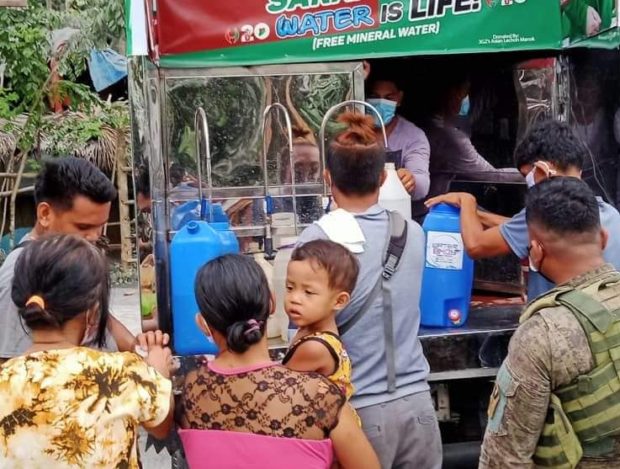 A water purifier truck provides clean drinking water to residents displaced by the phreatic eruption of Mount Bulusan in Sorsogon province. (Photo courtesy of Nelson Bulalacao)