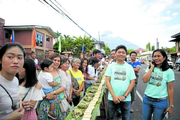 The street boodle fight for “pinangat,” one of Bicol’s famous dishes, is one of the highlights of the Pinangat Festival staged in Camalig town, Albay province. It was last held in May 2019 and has been suspended for the past three years due to the COVID-19 pandemic. STORY: Albay town scraps Pinangat Festival anew due to COVID-19