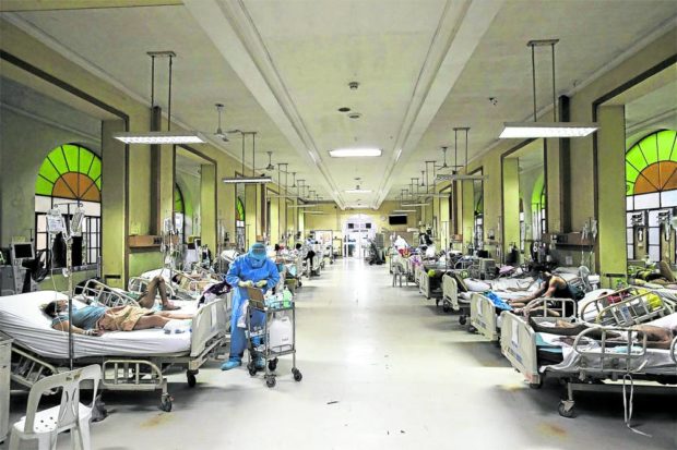 FULLY BOOKED The COVID-19 ward at the Philippine General Hospital looked like this in this photo taken a year ago. —INQUIRER FILE PHOTO