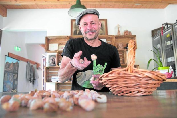  Snail breeder Andreas Gugumuck at his “Wiener Schnecken” farm in Vienna. STORY: Snails slowly reclaiming their culinary fame