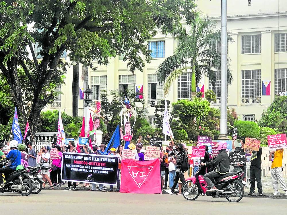 In Cebu City, activists hold a protest rally in front of the Cebu capitol 