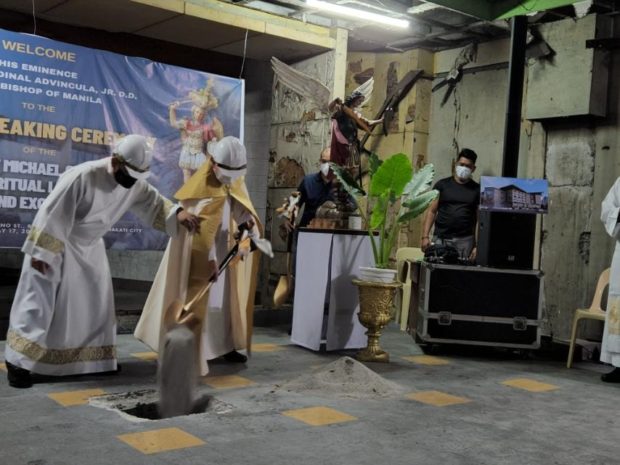 Archbishop of Manila Jose F. Cardinal Advincula Jr. and Rev. Fr. Francisco Syquia, Director of the Archdiocese of Manila Office of Exorcism leads the groundbreaking ceremony of Saint Michael Center for Spiritual Liberation and Exorcism. Contributed photo.