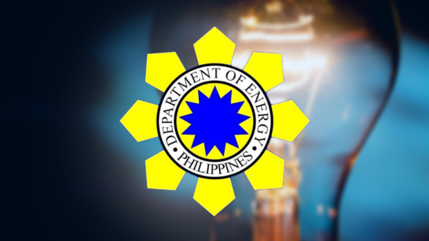 Composite photo of light bulb with Department of Energy logo superimposed. STORY: Earth Hour 2023 in PH saves 62.69 MW of electricity