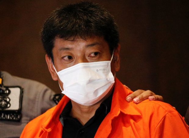 Japanese fugitive accused of fraud deported from Indonesia