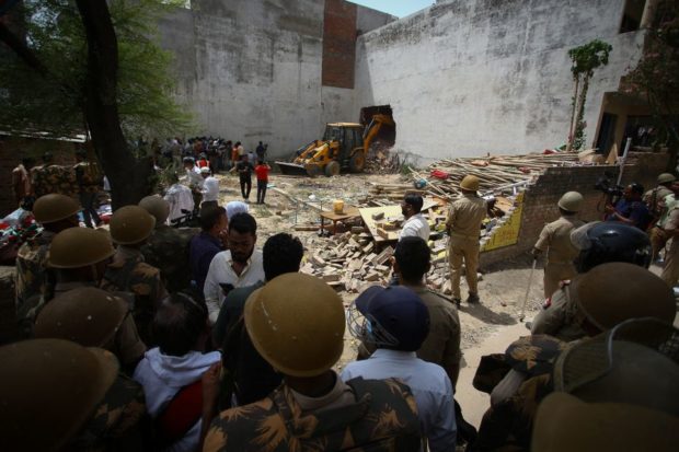 Indian officials step up arrests, demolish houses to stop unrest over anti-Islam remarks