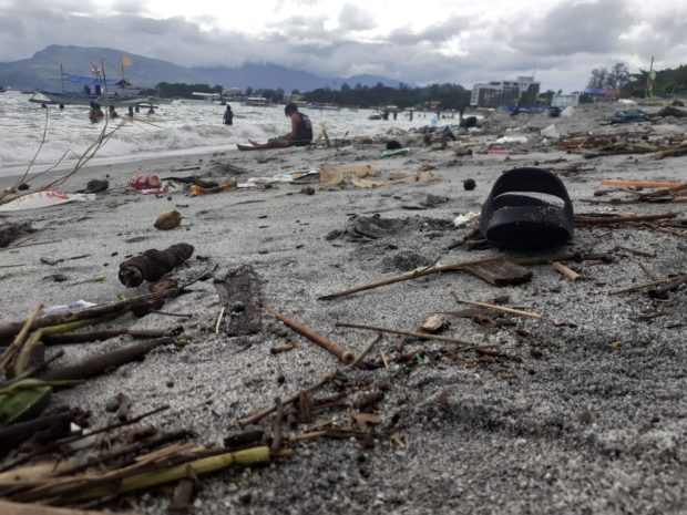 Trash and other solid materials end up at a beach area in Barangay Barretto, Olongapo City. (Photo by Joanna Rose Aglibot)