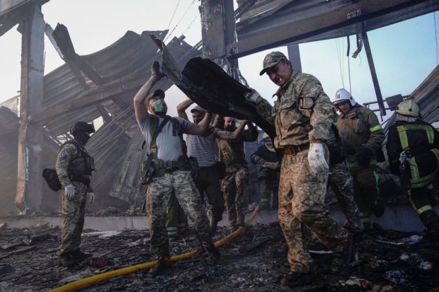 Rescuers dig for survivors after Russian missiles pound Ukrainian shopping mall
