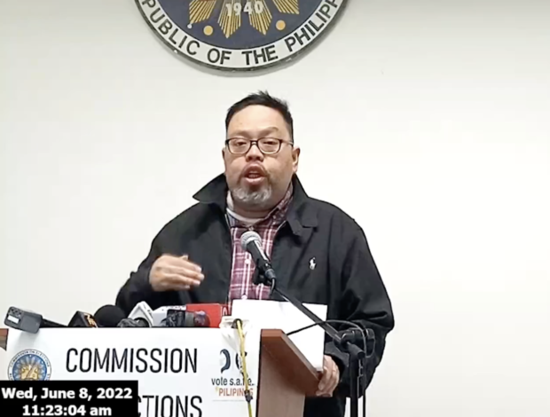 Director James Jimenez, chief of the Comelec Education and Information Department, speaks during the deletion of the 2022 ballot face database from the NPO's servers. Screengrab from Comelec / Facebook