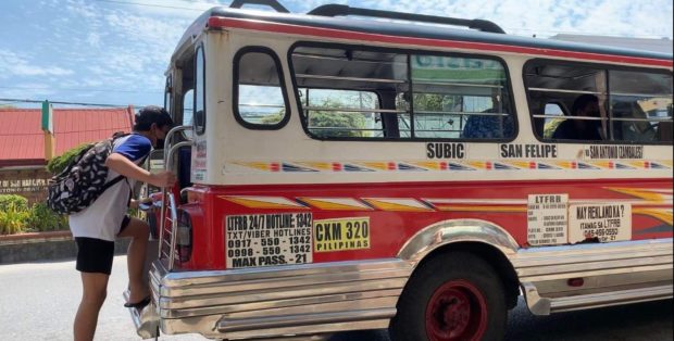 Caption: A public utility jeepney in San Antonio town, Zambales province, picks up passengers along the national road. (Photo by Joanna Rose Aglibot)