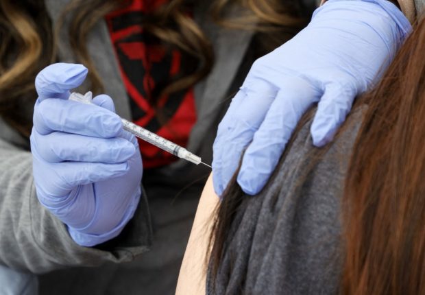 Las Vegas Strip Club Hosts Pop-Up Vaccine Clinic For Boosters. STORY: US foresees annual COVID booster, just like flu shot