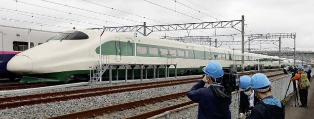 Shinkansen bullet train painted with nostalgic design to mark Japan-transport anniversaries