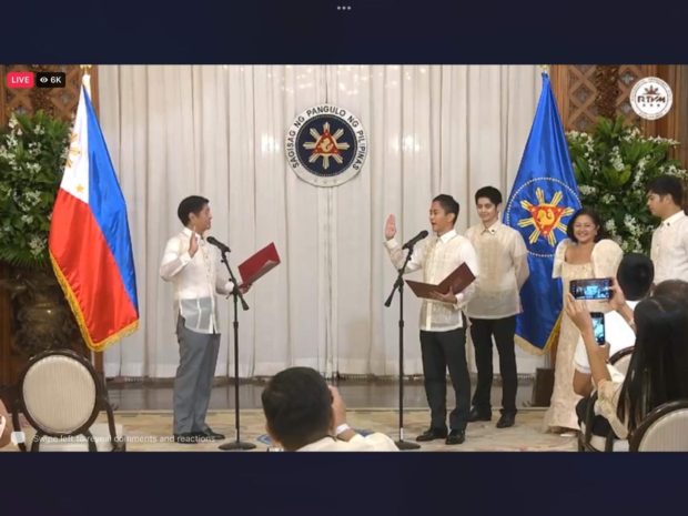 President Bongbong Marcos administers the oath of office of his son, Sandro, as the district representative of their hometown and bailiwick Ilocos Norte.