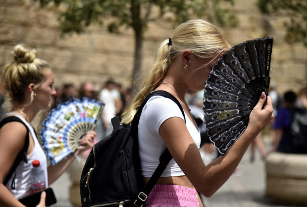 Spain sounds high alert for scorching heatwave