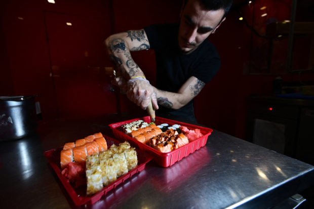 ‘War is war’ but Ukraine sushi bar serves lunch on time