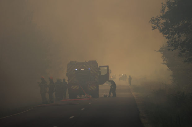 France on alert as forest fires rage in scorching southwest Europe
