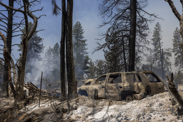 California wildfire rages as US bakes in record-setting heatwave