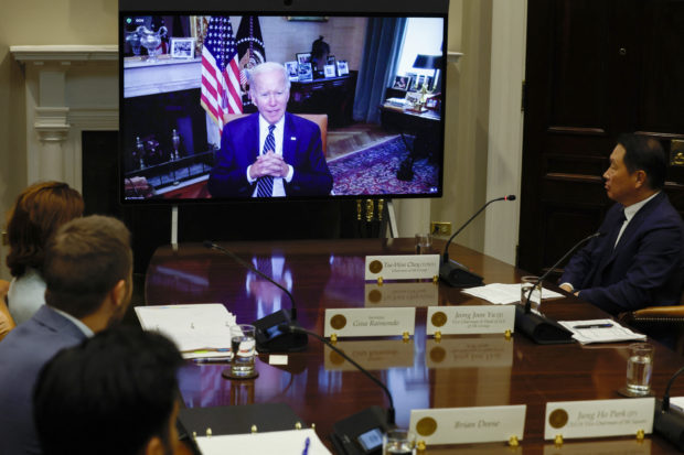 President Joe Biden participates virtually in a meeting with members of the SK Group, including the Chairman and Principal Owner Chey Tae-won in the White House on July 26, 2022 in Washington, DC. During the meeting President Biden discussed the companys investments in United States manufacturing and jobs.   Anna Moneymaker/Getty Images/AFP (Photo by Anna Moneymaker / GETTY IMAGES NORTH AMERICA / Getty Images via AFP)
