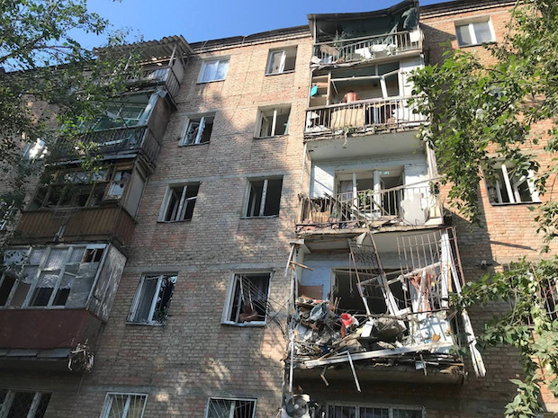 Damaged residential building is seen at the site of the missile strike in Mykolaiv. STORY: Blasts rock southern city as Russia grinds out gains in east Ukraine 