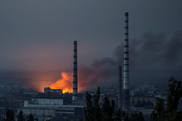 Smoke and flame rise after a military strike on a compound of Sievierodonetsk's Azot Chemical Plant, as Russia's attack on Ukraine continues, in Lysychansk, Luhansk region, Ukraine June 18, 2022. REUTERS/Oleksandr Ratushniak