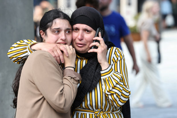 People react outside Field's shopping centre, after Danish police said they received reports of shooting, in Copenhagen, Denmark, July 3, 2022. Ritzau Scanpix/Olafur Steinar Gestsson  via REUTERS