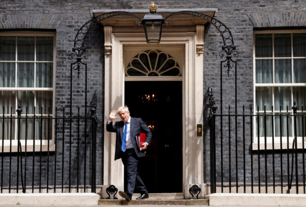 British Prime Minister Boris Johnson walks at Downing Street, in London, Britain, July 6, 2022. REUTERS/John Sibley