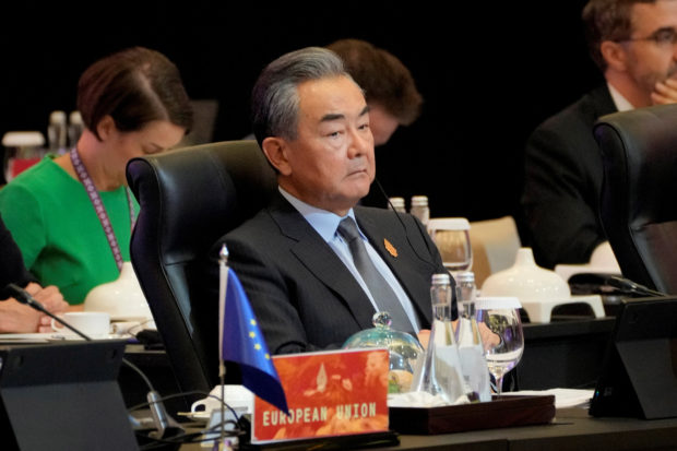 FILE PHOTO: Chinese Foreign Minister Wang Yi attends the opening session of the G20 Foreign Ministers’ Meeting in Nusa Dua, Bali, Indonesia, Friday, July 8, 2022. Dita Alangkara/Pool via REUTERS