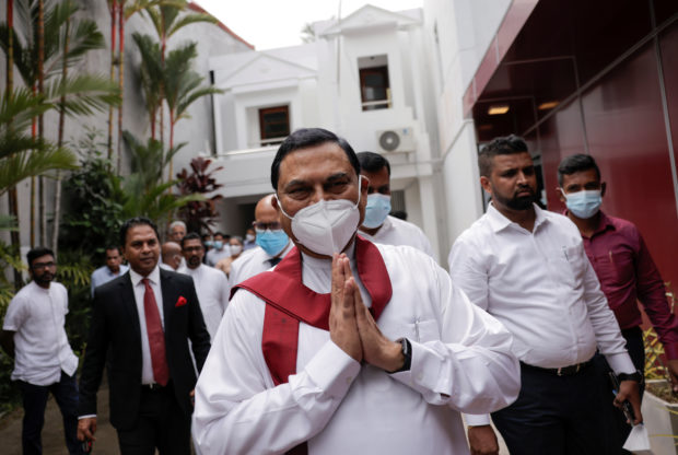 Basil Rajapaksa, one of the brothers of Sri Lanka's president Gotabaya Rajapaksa, gestures as he leaves after he announced that he had resigned from parliament, amid the country's economic crisis, in Colombo, Sri Lanka, June 9, 2022. REUTERS/Dinuka Liyanawatte