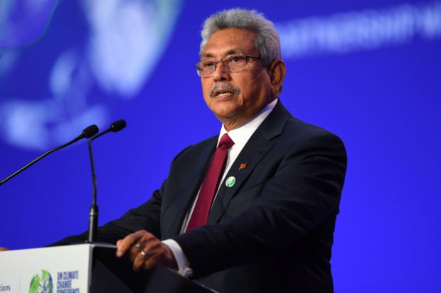 FILE PHOTO: Sri Lanka's President Gotabaya Rajapaksa presents his national statement as a part of the World Leaders' Summit at the UN Climate Change Conference (COP26) in Glasgow, Scotland, Britain November 1, 2021. Andy Buchanan/Pool via REUTERS