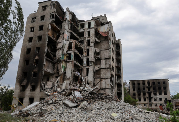 A view shows apartment buildings damaged during Ukraine-Russia conflict in the town of Popasna in the Luhansk region, Ukraine July 14, 2022. REUTERS/Alexander Ermochenko