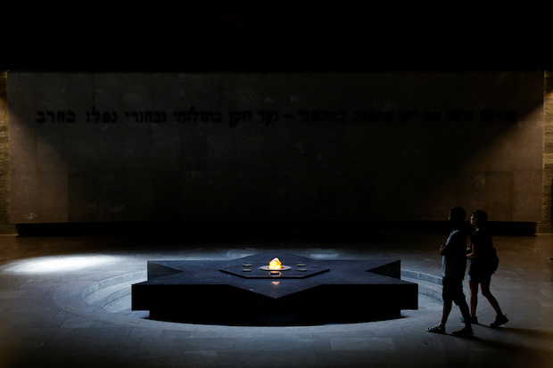 People visit the crypt inside the Shoah Memorial in Paris. STORY: France races to record accounts of 1942 Jewish roundup