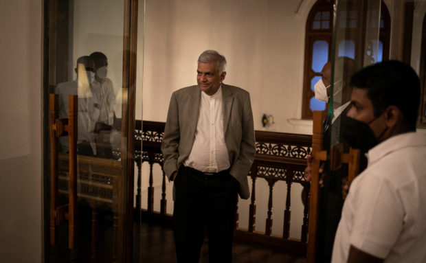 Sri Lanka's Prime Minister Ranil Wickremesinghe arrives for an interview with Reuters at his office in Colombo, Sri Lanka, May 24, 2022. REUTERS/Adnan Abidi/Files