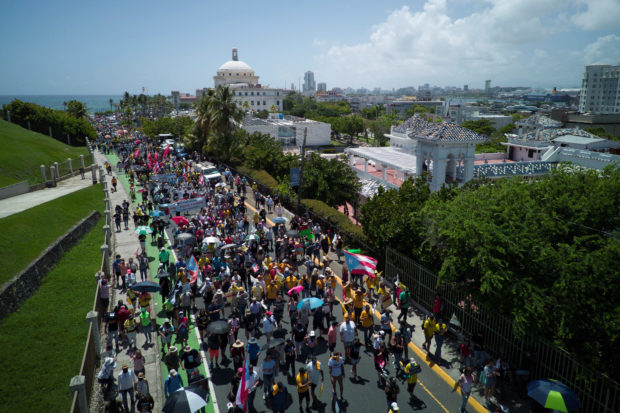 An aerial view of a protest to demand the cancellation of electricity grid operator LUMA Energy contract outside the governor’s mansion La Fortaleza in San Juan, Puerto Rico July 20, 2022. REUTERS/Ricardo Arduengo