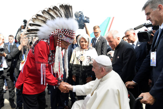 Pope Francis is welcomed after arriving at Edmonton International Airport, near Edmonton, Alberta, Canada July 24, 2022.Vatican Media/­Divisione Produzione Fotografica/Handout via REUTERS