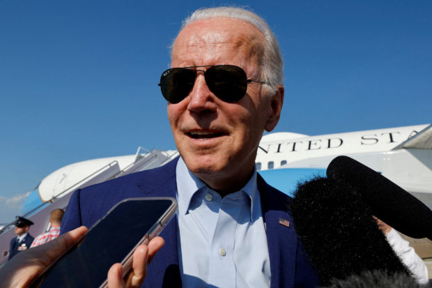 FILE PHOTO: U.S. President Joe Biden speaks to the media as he arrives at Joint Base Andrews, Maryland, U.S. July 20, 2022. REUTERS/Jonathan Ernst/File Photo