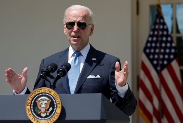 U.S. President Joe Biden delivers remarks to staff in the Rose Garden as he returns from COVID-19 isolation to work in the Oval Office at the White House in Washington, U.S. July 27, 2022. REUTERS/Jonathan Ernst