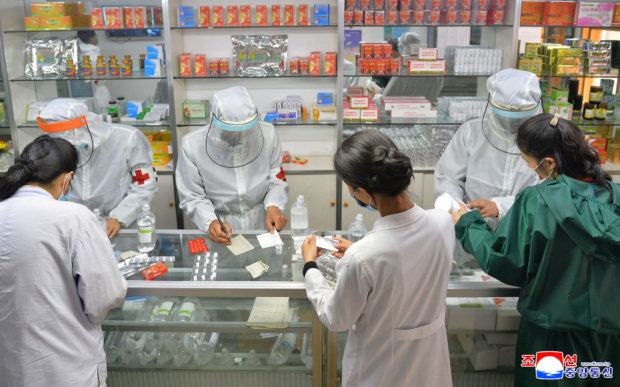 FILE PHOTO: Army medics involved medicine supply distribution work amid the COVID-19 pandemic in Pyongyang, North Korea May 22, 2022 in this photo released May 23, 2022 by the country's Korean Central News Agency.  KCNA via REUTERS