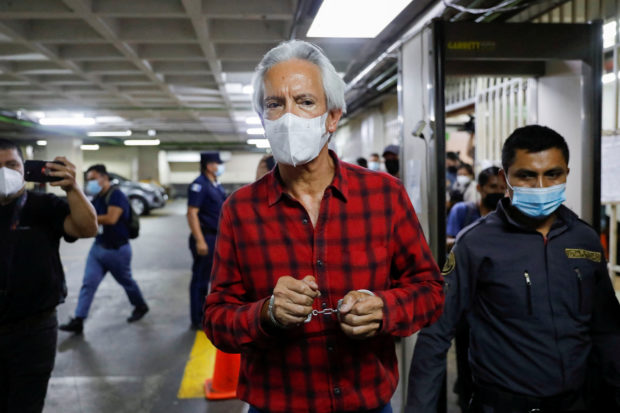 Jose Ruben Zamora Marroquin, founder and president of El Periodico newspaper, who was detained on accusations of money laundering and blackmail by Guatemalan authorities, walks out of a hearing in a judicial building in Guatemala City, Guatemala July 30, 2022. Zamora said he was beginning a hunger strike in a show of rejection to his persecution. REUTERS/Luis Echeverria