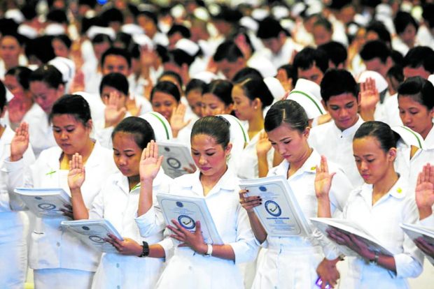Nurse taking their oath. STORY: CHEd ends 11-year curb on new nursing courses