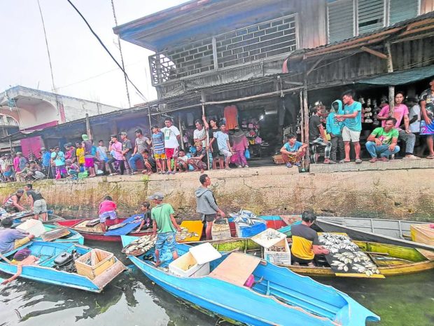 Soon, vendors in this floating market in Sitangkai town of Tawi-Tawi province, in this photo taken on July 15, will have the option to sell their goods on dry land once the construction of the town’s public market building, a project of the Bangsamoro government, is finished. STORY: ‘Remote’ Tawi-Tawi islands get projects