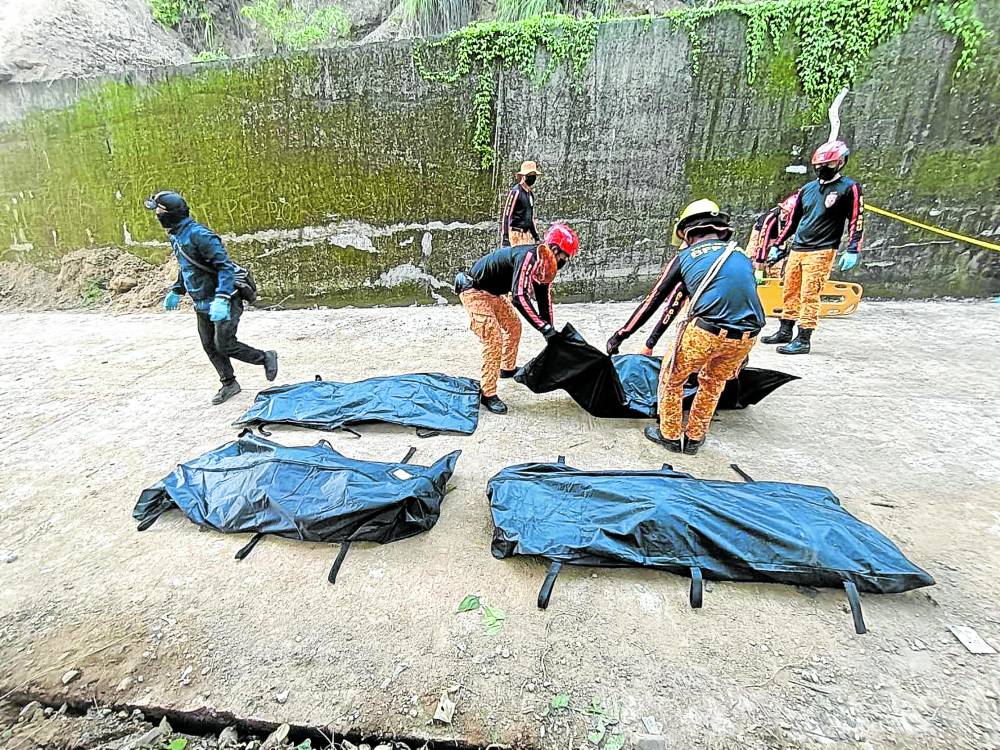 Four bodies, including that of two minors, are recovered on Friday from the site of a landslide at Sitio Bangel in Barangay Poblacion, Luba, Abra