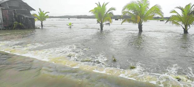 Non-stop rains flood rice fields, barangays in Antique