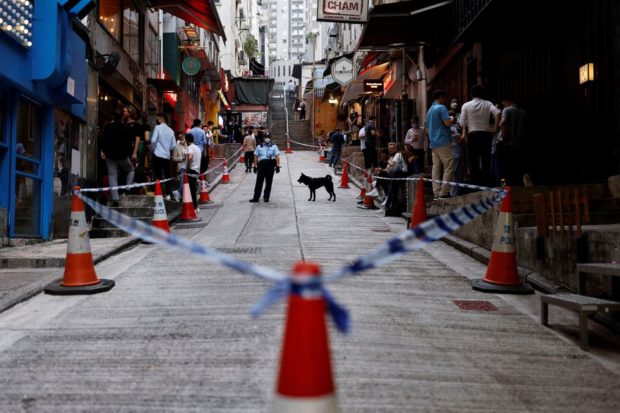 Hong Kong considers shorter COVID quarantine for travellers -Lee