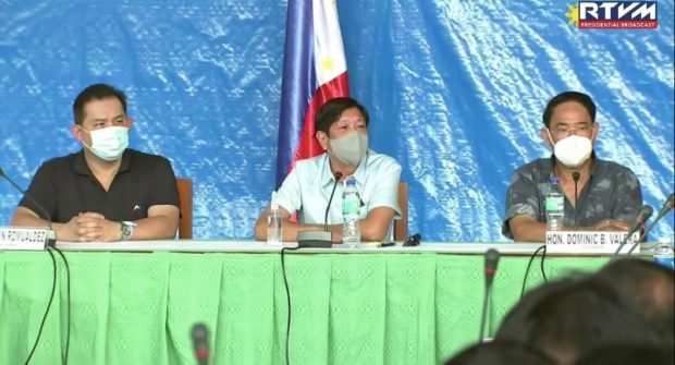 President Ferdinand Marcos Jr. (center) holds a situation briefing at Bangued, Abra on Thursday after the Magnitude 7.0 earthquake that rocked the province and nearby areas on Wednesday. Seated beside Marcos is House Speaker Ferdinand Martin Romualdez (left) and Abra Governor Dominic Valera. (Screenshot from RTVM livestream)