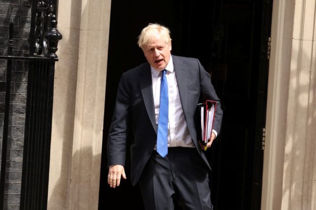 Boris Johnson 'up for a fight' as clamour to quit grows