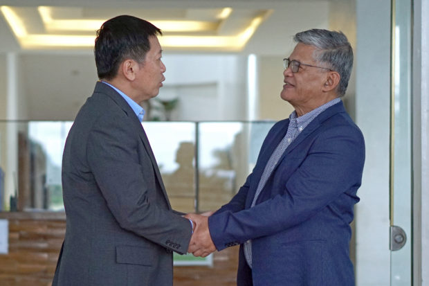  Chinese Consul General Li Lin (left) shakes the hand of Agusan del Sur Governor Santiago B. Cane Jr.