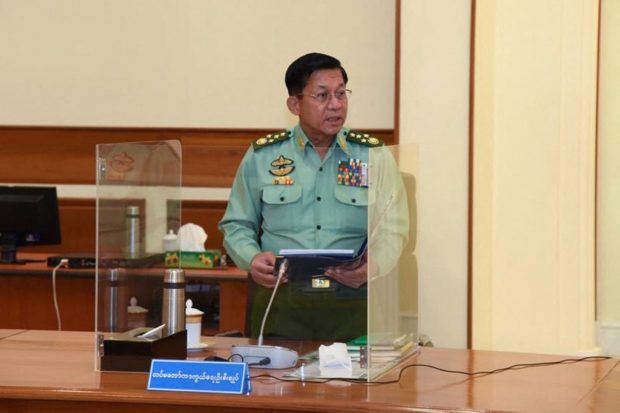 This handout image taken on January 31, 2022 by the Myanmar Military Information Team shows Myanmar junta chief Min Aung Hlaing speaking in the capital Naypyidaw.