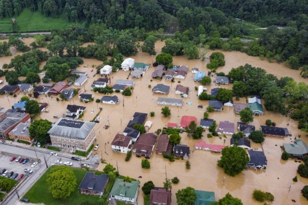 Aerial view of homes submerged under flood waters from the North Fork of the Kentucky River in Jackson, Kentucky, on July 28, 2022. 