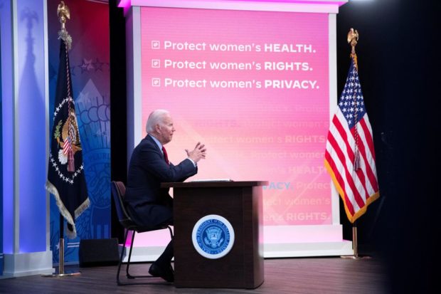 Biden predicts states will try to arrest women who travel for abortions