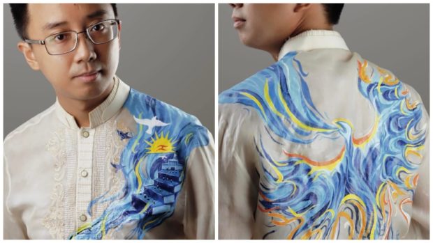 A phoenix, stretching its wings across the back of his barong, represents the role of the Filipino youth in bringing hope to the country amid a culture of killings and darkness, according to Raoul Manuel.
